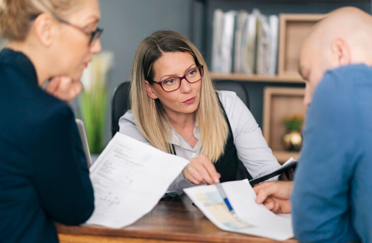 A person discussing their eligibility for traffic ticket deferral with a lawyer