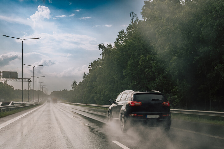 A car driving recklessly on a highway