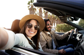 Two Florida motorists smile as the cruise down the highway, confident with their knowledge of the Florida License Point system.